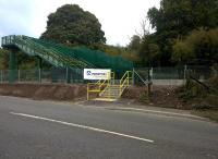 This sturdy new footbridge has just been completed at Shockerwick (near Box) between Bath (right) and Chippenham (left). The tall walls will doubtless deter vandalism, but will make photography [see image 42041] more difficult.<br><br>[Ken Strachan 10/10/2015]