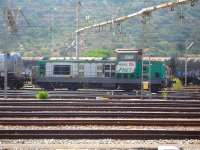 SNCF Fret Bo-Bo diesel loco 469203 propels a fully loaded intermodal rake into the Portbou SNCF/RENFE interchange yard, no doubt having been brought over the border from the nearby SNCF yard at Cerbere in France. Almost immediately afterwards an Adif Bo-Bo freight loco set off in the opposite direction with a rake of empty intermodal wagons being taken through the tunnel to Cerbere.   <br><br>[David Pesterfield 07/08/2015]