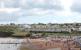 GWR 2-8-0T 5239 starts the climb to Churston on 25 July running behind the beach huts at Goodrington. The seven coach Paigton to Kingswear train includes a <I>Devon Belle</I> observation car. <br><br>[Mark Bartlett 25/07/2015]