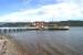 The paddle steamer <I>Waverley</I> calls at Tighnabruaich on 1 August 2015 whilst on a cruise from Glasgow. Behind the ex LNER steamer is the Island of Bute. In the building at the entrance to the pier were poster boards still displaying 'British Railways' in Scottish Region colours.<br><br>[John McIntyre 01/08/2015]