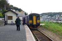 Looking towards the buffers at Looe with passengers boarding 153305 for the journey to Liskeard on 14 October 2015.<br><br>[John McIntyre 14/10/2015]