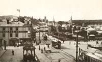 Three trams at Rothesay's Esplanade. The pier is off to the right. The Temperance Hotel is now the Esplanade Hotel.<br><br>[Ewan Crawford Collection //]