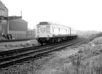 An Edinburgh Waverley - Glasgow Central via Shotts DMU turns south west towards Slateford at Haymarket East Junction in April 1980, shortly after restarting from Haymarket station. The unit carries Greater Glasgow/Trans-Clyde branding.<br><br>[John Furnevel 18/04/1980]