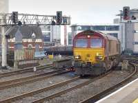About to pass through Cardiff Central on 20 October is 66175 with a train of imported (!) coal from Avonmouth Docks on its way to Aberthaw Power Station.<br><br>[Bill Roberton 20/10/2015]