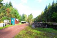 A general view of the Invergarry station site with new platform edging waiting to be installed. The signal box foundations, mid way along the platform, are marked by barrier tape.<br><br>[John Gray 23/10/2015]