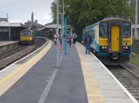 Platform 1 has been reinstated at Cardiff Queen Street allowing the Cardiff Bay shuttle to operate without interfering with the through valley trains. 153367 is seen in the reinstated bay with another  service on the short branch on 21st October 2015 while Pacer 143623 can be seen on the left.<br><br>[Bill Roberton 21/10/2015]