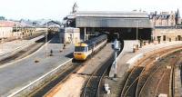 The south end of Perth station in July 1992, with a BR InterCity 125 HST forming the up Inverness - London Kings Cross <I>Highland Chieftain</I> about to restart from platform 4.<br><br>[John Furnevel 16/07/1992]