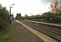 While we are waiting for Coventry Arena and Bermuda Park stations to open, let us at least enjoy the lengthened platforms at Bedworth; seen here on 17 October fenced off in a somewhat half hearted fashion.<br><br>[Ken Strachan 17/10/2015]