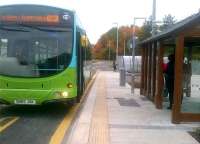 The connecting Border Weavers bus stops at the new bus shelter at Tweedbank station in October 2015. The station is just off to the right. [See image 53035].<br><br>[John Yellowlees 25/10/2015]