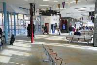 The transport interchange at Galashiels on 20 October, still en fete with bunting weeks after the Borders line reopening. The rail platform is across the A7 on the left, via a much needed pedestrian crossing.<br><br>[David Panton 20/10/2015]