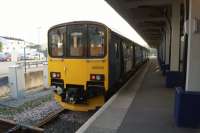 The end of the line from Truro at Falmouth Docks station on 12 October 2015. 150130, having just arrived, after a quick turn around makes its way back to Truro.<br><br>[John McIntyre 12/10/2015]