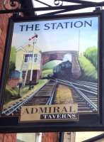 Not every pub sign is as realistic as that at Wingate [see image 52304]. This small station between Leicester and Burton never had a stone road bridge next to it, and certainly never had a signal box called St. Denys. Maybe the painter hailed from Southampton?<br><br>[Ken Strachan 02/10/2015]