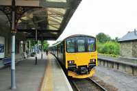 FGW Sprinter 150131 waits alongside Bere Alston station building on a Gunnislake to Plymouth service. Behind, while the driver walks to the other end of the train, the guard has to change the points back to the <I>main line</I>.<br><br>[Mark Bartlett 29/07/2015]