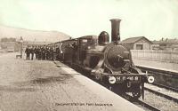 H.R. No. 48 at Fort Augustus during the period (1903-1907) that the Highland Railway operated the Invergarry and Fort Augustus Railway. The main platforms are shown here with the goods yard off to the right and through platform to the pier station on Loch Ness to the left (disused 1906). A small portion of that platform survives to this day [see image 574]. The publisher of this postcard took an interesting approach to sky colourisation.<br><br>[Ewan Crawford Collection //]