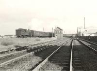 Gresley V1 2-6-2T 67621 passing Clydebank East Junction on 18 April 1957 with a down stopping train for Helensburgh Central.  <br><br>[G H Robin collection by courtesy of the Mitchell Library, Glasgow 18/04/1957]