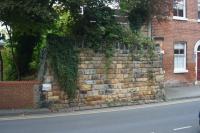 The remains of a bridge over Garden St in Preston is one of the structures of the Preston to Walton Tramroad that once linked the Lancaster Canal to the Leeds Liverpool Canal. The tramroad closed around about 1864 and while the route to the south of the River Ribble is used as a footpath, this section through Preston is less easy to find.[See image 29701] for a view of the modern replica of the bridge over the river.<br><br>[John McIntyre 03/10/2015]