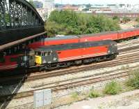 Virgin 47818 <I>Strathclyde</I> passes below the bridge carrying the A4 on the approach to Bristol Temple Meads in August 2002 with a CrossCountry service from the west of England. <br><br>[Ian Dinmore 02/08/2002]