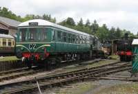 Yard scene at Buckfastleigh in July 2015. Gloucester RC&W <I>Bubblecar</I> W55000 stands alongside GWR 0-6-0PT 6412. Behind the DMU are Class 08 D3721, a <I>Toad</I> brakevan, a <I>Weltrol</I> wagon and GWR 0-4-2T 1420, which is under overhaul. <br><br>[Mark Bartlett 26/07/2015]