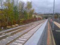 The new facing crossover at Anniesland, as seen from the station on 12th November 2015. Three points have been installed reinstating Knightswood South Junction that allows trains to and from Hyndland to use the Maryhill line.<br><br>[John Yellowlees 12/11/2015]