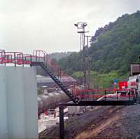 Oil tanks in the high level goods siding above Oban Bay looking south in 1990. Originally the Lochavullin goods yard was off to the left, this siding being the sole survivor.<br><br>[Ewan Crawford //1990]