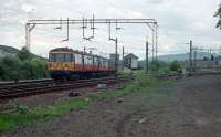 The junction for Milngavie at the west end of Westerton station seen in 1989 before the branch was reduced to one track. The photograph was taken during a weekend of PW works partly relaying the track which would be retained.<br><br>[Ewan Crawford 06/06/1989]