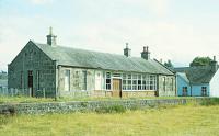 Nethy Bridge station in August 1982, still in a good state of repair following closure in 1965. At this time it was in use as a BR Staff Hostel, a role that continued as the building survives to this day [See image 960]<br><br>[Peter Todd /08/1982]