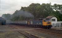 47633 working hard to leave Pitlochry in 1990. The goods shed seen in the left background is long gone.<br><br>[Ewan Crawford //1990]