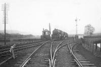 Black 5 44972 pilots classmate 44978 through Almond Valley Junction on 6 April 1953 with the down <I>Royal Highlander</I>.<br><br>[G H Robin collection by courtesy of the Mitchell Library, Glasgow 06/04/1953]