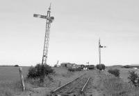 Looking east at the base for the Lochty Private Railway on 2 July 1992. Most of track had been lifted with only enough left to allow removal of the remaining stock.<br><br>[Bill Roberton 02/07/1992]