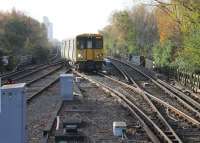 507007 emerges from the turnback siding at Sandhills to return to Ormskirk in November 2015. The EMU had been terminated here due to <I>a track fault at Liverpool Central</I>. Passengers transferred to a packed train from Southport to continue their journeys. [See image 44642] for the more usual arrangements at this location.<br><br>[Mark Bartlett 16/11/2015]