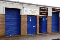 In the Branchline Industrial Estate is the 'Old Station Garage' business which relocated from Troon Old Station. This station was on the original alignment which became the direct bypass line and the station's former yard is now a housing estate.<br><br>[Colin Miller 31/10/2015]