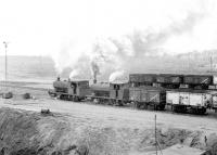 A pair of hard working NCB Pugs leaving Polkemmet Colliery on a grey 11 February 1972 with another trainload of coal destined for the BR exchange sidings.<br><br>[John Furnevel 11/02/1972]