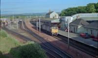 A 47 arrives with the less than taxing Edinburgh portion of a mail train in 1989. The Edinburgh-Carstairs line had not yet been electrified.<br><br>[Ewan Crawford //1989]