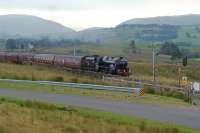 The first day of a railtour from Preston to Mallaig, The West Highlander on 10 September 2011, with Black 5 no.44932 working hard passing Scout Green on the climb from Tebay to Shap summit.<br><br>[John McIntyre 10/09/2011]