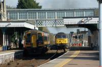 Colas 47739 approaches Sleaford on 18 March 2011 with a train of steel from Boston Docks. On the left EMT 158785 waits with a service to Skegness.<br><br>[John McIntyre 18/03/2011]