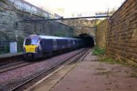 334018 forms the rear set of a 6 car Helensburgh to Edinburgh service on 22 November 2015. The train has just departed from Glasgow Queen Street Low Level and is entering the High Street tunnel.<br><br>[John McIntyre 22/11/2015]