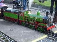 A fine example of a 7.25 inch gauge working model of a North Eastern Railway liveried Worsdell C class 0-6-0 tender loco seen during a station stop on the Ryedale Society of Model Engineers multi gauge layout by the village hall at Gilling East, North Yorkshire. Passenger days operate Sundays and Bank Holidays from April to September as well as on Gala days. <br><br>[David Pesterfield 05/04/2015]