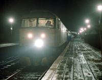 Inverness-Glasgow 47 hauled train pauses at Pitlochry in 1989. The photograph was taken from the timber extensions to the platforms at the south end of the station. We were well ahead of time, time enough to race out with a tripod and get back on board.<br><br>[Ewan Crawford //1989]