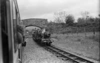 A view from an eastbound train arriving at Irton Road on the Ravenglass and Eskdale Railway as a service for Ravenglass waits in the loop on 30 May 1972.<br><br>[John McIntyre 30/05/1972]