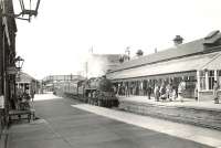 BR Standard Class 4 2-6-0 no 76092 entering Saltcoats station on 22 August 1957 with a Largs - St Enoch train. The locomotive had been delivered new to Corkerhill from Horwich works two months earlier. <br><br>[G H Robin collection by courtesy of the Mitchell Library, Glasgow 22/08/1957]