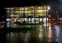 The new station at Northampton [see image 52330] on a soaking wet Friday night. The previous station building (plan view still shown on the National Rail website) was in the area now used for road vehicle access. View looks South, adjacent to platform 1.<br><br>[Ken Strachan 27/11/2015]