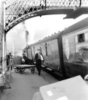 A Glasgow St Enoch - Carlisle stopping train calls at Cumnock in the early 1960s behind an unidentified <I>Clan</I> Pacific. [Ref query 21355]<br><br>[John Furnevel Collection //]