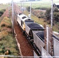 60061 <I>Alexander Graham Bell</I> in BR coal sector livery southbound on the WCML shortly after passing through Carstairs with a coal train on 12 August 1997.<br><br>[John Furnevel 12/08/1997]