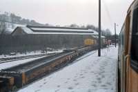 A track renewal train shunts the yard at Blair Atholl, viewed from a northbound service hauled by 47644 in early 1990. The old locomotive shed is in the background.<br><br>[Ewan Crawford //1990]