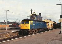 47244 westbound with stone empties, bound for the Somerset quarries.<br><br>[Peter Todd 18/01/1983]