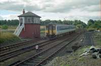 Northbound Sprinter 156496 passes Auchterarder box in 1990, viewed from the end of the platform at the former station.<br><br>[Ewan Crawford //1990]