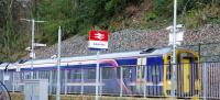 A number of timelines merge at Galashiels on 4 December 2015.  The line originally opened in 1856, closed in 1969 and reopened in 2015.  In the service of Abellio since 2015, Class 158 No 158705, built in 1989, is seen here in the livery of First Scotrail which was first introduced in 2004.  Discounting the remarkable line reopening, perhaps the most noteworthy part of the scene is the continued use of the British Rail double arrow logo, first introduced in 1965.<br><br>[Malcolm Chattwood 4/12/2015]