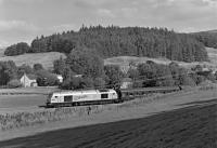 67026 Diamond Jubilee emerges from the cutting just to the north of Stow. 10 September 2015<br><br>[Bill Jamieson 10/09/2015]