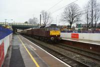 WCRC 47804 heads south at Leyland with the 'Edinburgh Christmas Statesman' railtour on 5 December 2015. The tour had started in Holyhead but never reached Edinburgh. The WCML was closed in Cumbria as a result of severe flooding and high winds caused by Storm Desmond. The tour had been halted at Oxenholme from where it is seen returning. Due to further weather related problems in Anglesey the train could not get back to Holyhead and was terminated at Bangor.<br><br>[John McIntyre 05/12/2015]