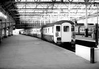 The DBSO of an Edinburgh Waverley - Glasgow Queen Street push-pull service standing at the west end of Waverley in 1984. On this occasion the class 47 locomotive is, unusually, on the other end of the train [see image 41458].<br><br>[John Furnevel 26/05/1984]